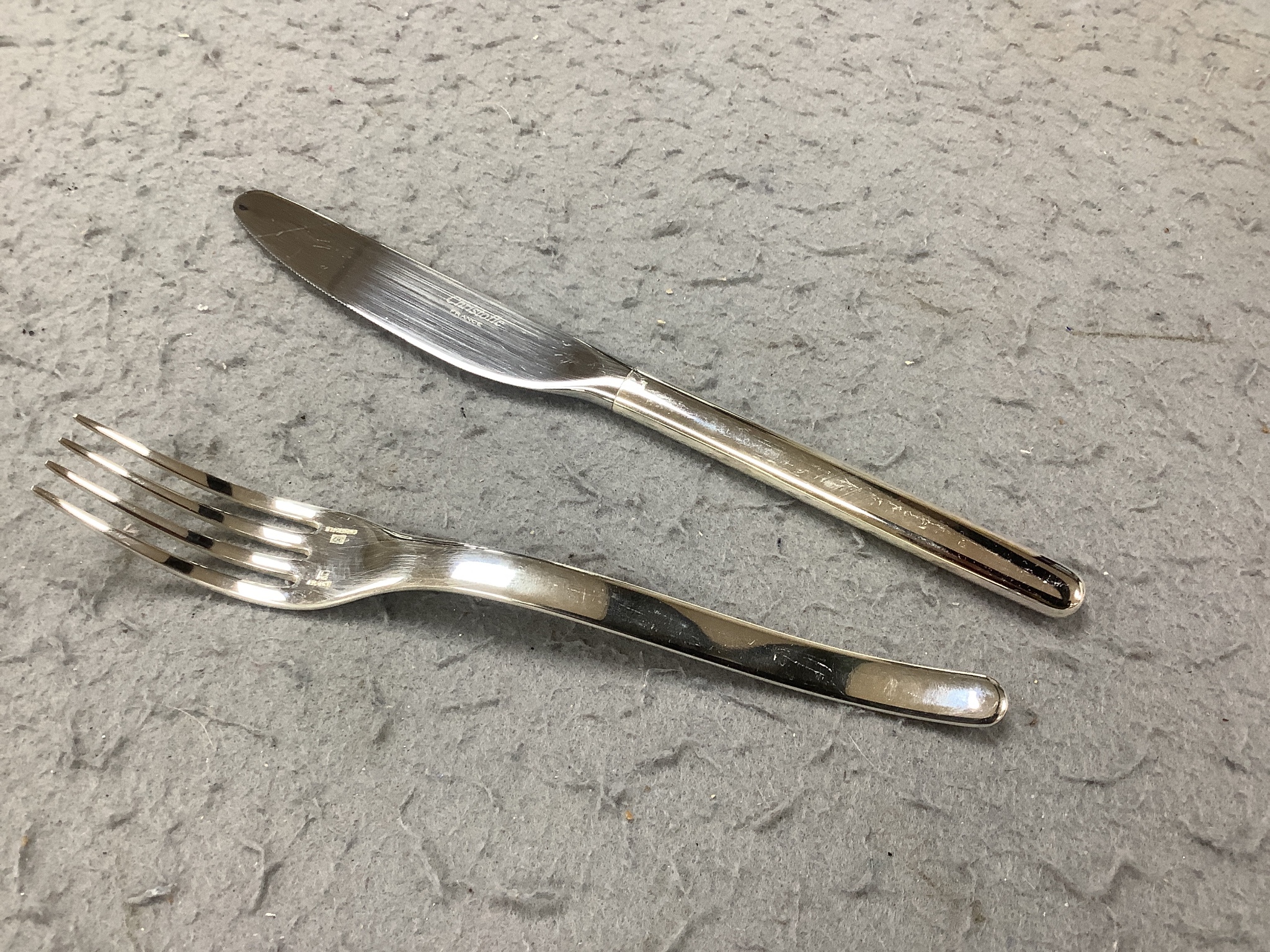 A Cristofle silver plated canteen of cutlery, comprising 84 items, in two trays.